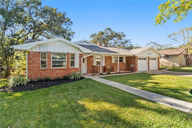 ranch-style home with a front lawn and a garage