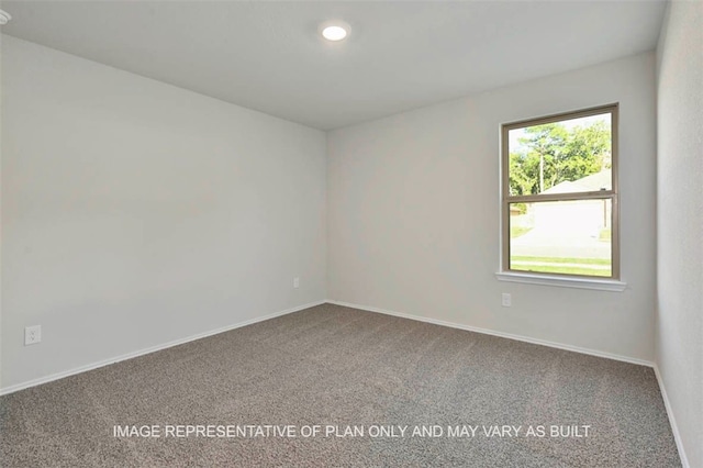 205 Rockbridge Dr, Huntsville, TX 77340 - carpeted spare room with baseboards and recessed lighting