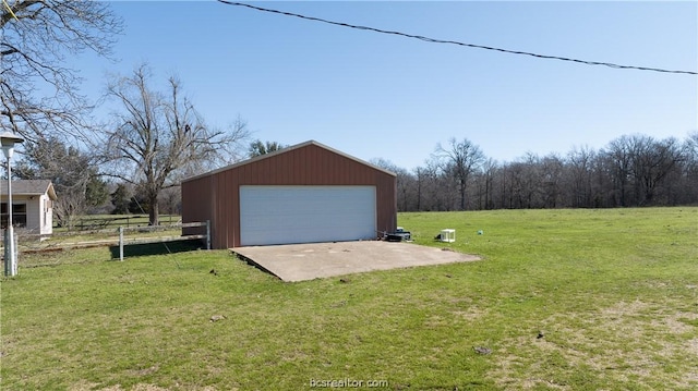 garage with a lawn