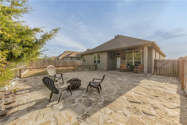 view of patio featuring a fire pit