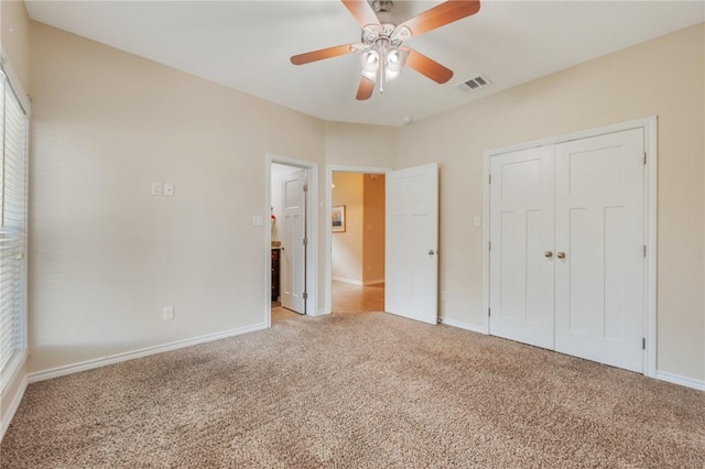 3609 Haverford Rd, College Station, TX 77845 - unfurnished bedroom featuring light colored carpet, a closet, and a ceiling fan