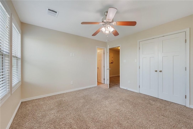 3609 Haverford Rd, College Station, TX 77845 - unfurnished bedroom featuring light colored carpet, a closet, and ceiling fan