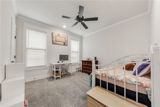 carpeted bedroom featuring crown molding and ceiling fan