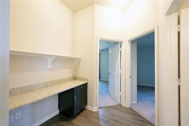 2135 Dumfries Dr, Bryan, TX 77807 - unfurnished office featuring dark wood finished floors and baseboards