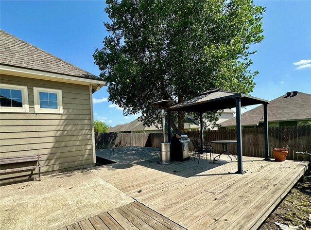 2135 Dumfries Dr, Bryan, TX 77807 - deck featuring a gazebo and a fenced backyard