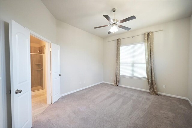 2135 Dumfries Dr, Bryan, TX 77807 - unfurnished bedroom with carpet, baseboards, and a ceiling fan