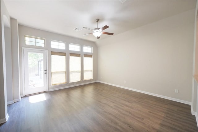 2135 Dumfries Dr, Bryan, TX 77807 - spare room with a ceiling fan, baseboards, and dark wood-style floors