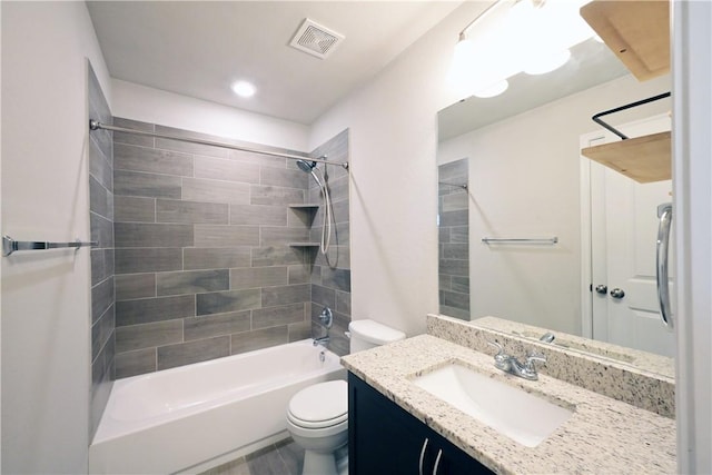 2135 Dumfries Dr, Bryan, TX 77807 - bathroom with vanity, toilet, tub / shower combination, and recessed lighting