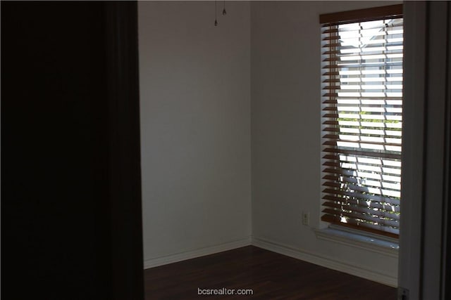 4031 Southern Trace Dr, College Station, TX 77845 - unfurnished room with dark wood finished floors and baseboards