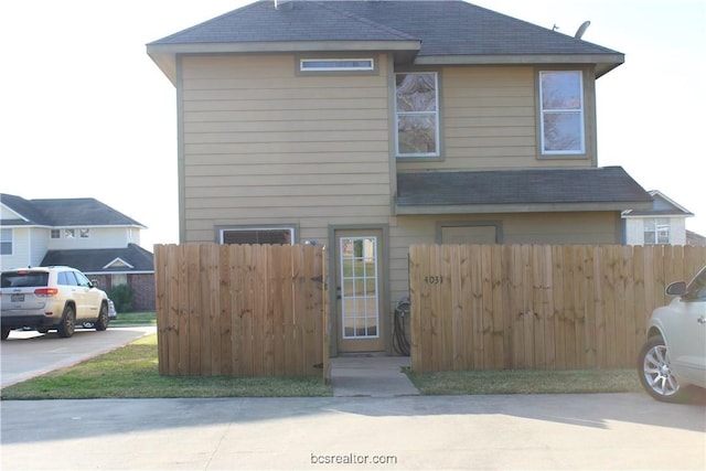 4031 Southern Trace Dr, College Station, TX 77845 - view of front of home featuring roof with shingles