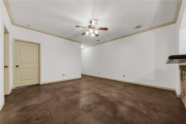 interior space with concrete flooring, ornamental molding, baseboards, ceiling fan, and visible vents