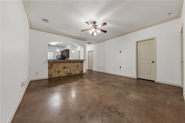 unfurnished living room with finished concrete flooring, baseboards, arched walkways, visible vents, and a ceiling fan