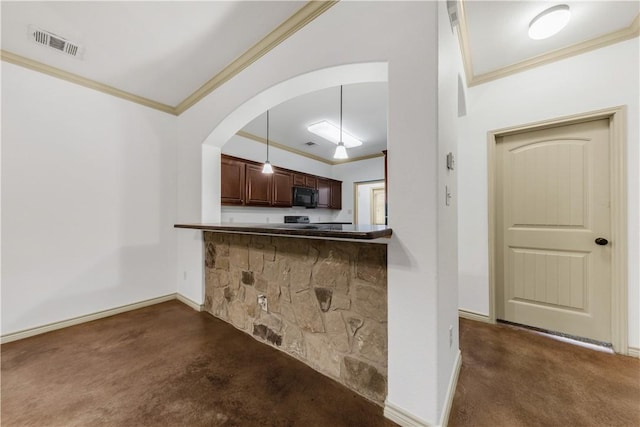 kitchen with black microwave, visible vents, crown molding, and dark carpet