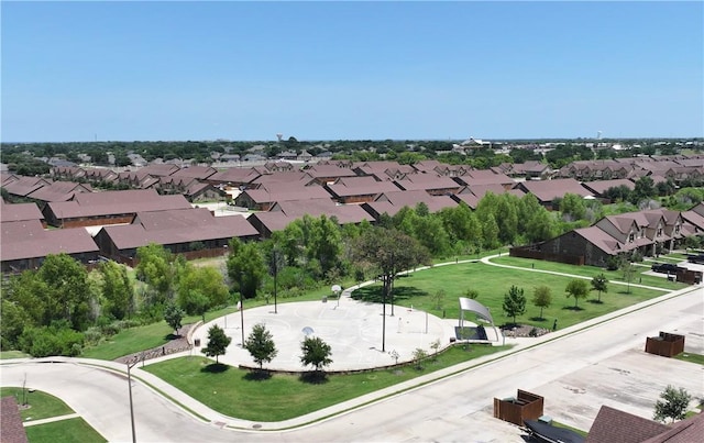 birds eye view of property with a residential view