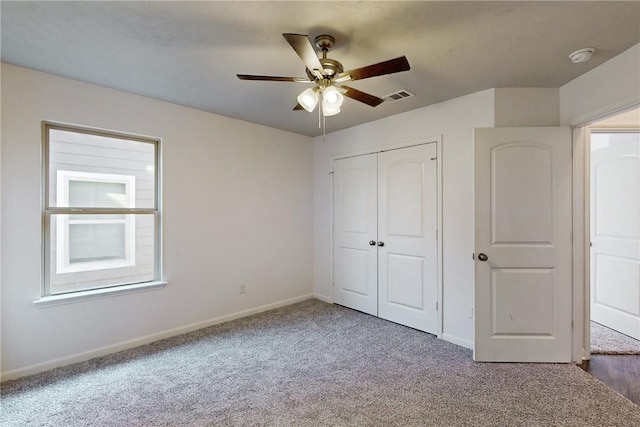 2038 Sorrento Ct, Bryan, TX 77808 - unfurnished bedroom featuring ceiling fan, carpet floors, and a closet