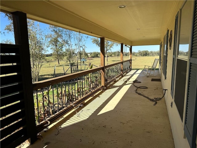 view of patio with a rural view