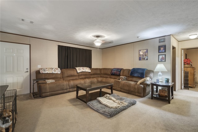 2095 Fm 1452 W, Madisonville, TX 77864 - carpeted living area featuring a textured ceiling and crown molding