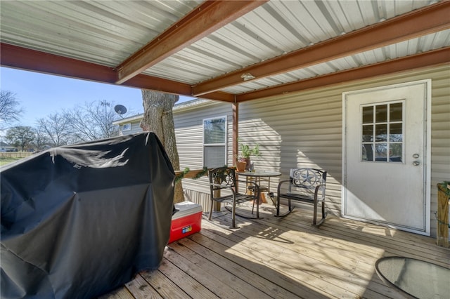2095 Fm 1452 W, Madisonville, TX 77864 - wooden deck with area for grilling and outdoor dining space