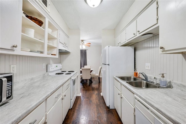 1900 Dartmouth St Unit F6, College Station, TX 77840 - kitchen with dark wood-style flooring, ceiling fan, a sink, white appliances, and light countertops