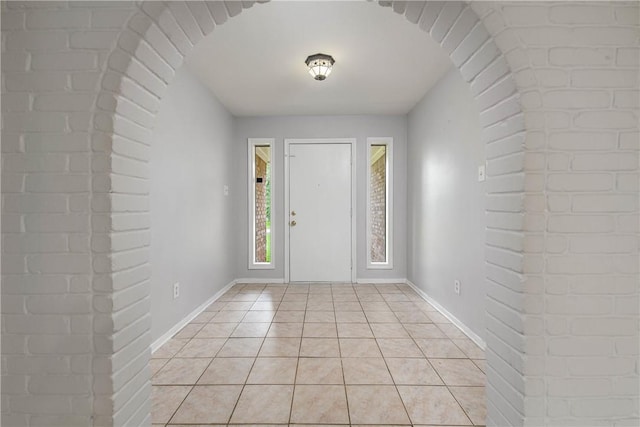 1011 Val Verde Dr, College Station, TX 77845 - foyer featuring arched walkways and light tile patterned flooring