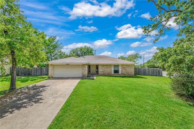 1011 Val Verde Dr, College Station, TX 77845 - ranch-style house with a garage, driveway, and brick siding