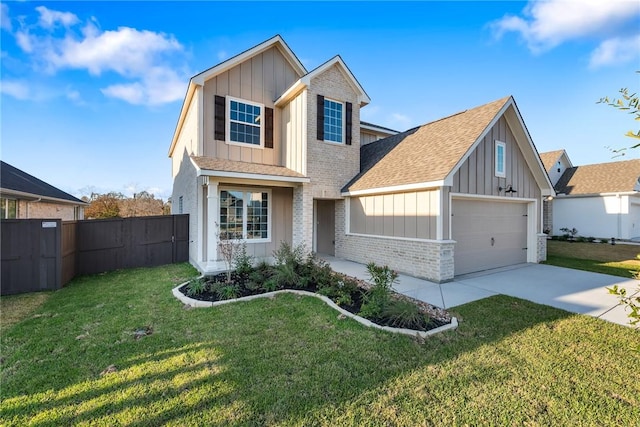 view of front of house with a front lawn and a garage