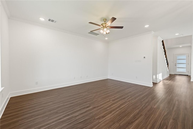 unfurnished room with ceiling fan, dark hardwood / wood-style floors, and ornamental molding