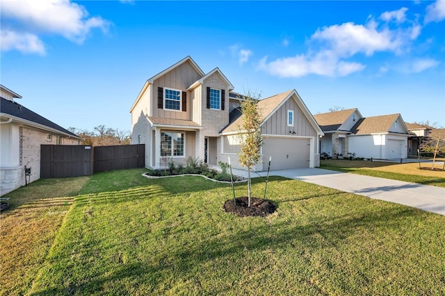 view of front facade with a front yard and a garage