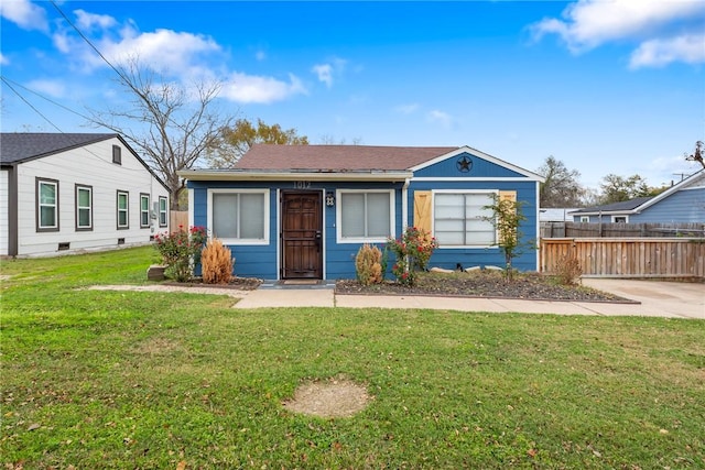 view of front of home with a front yard