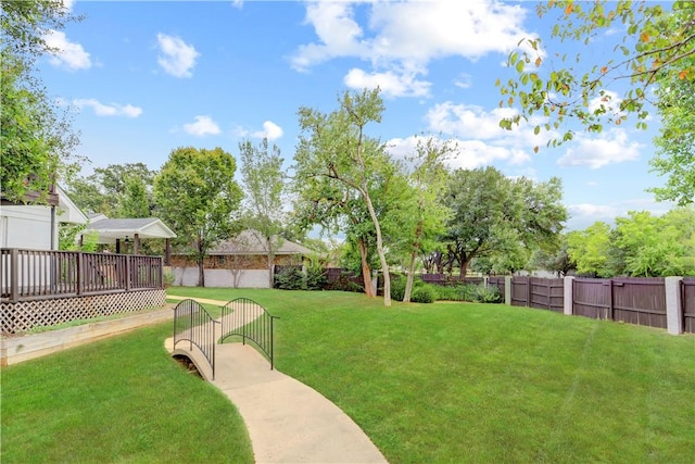 view of yard with a deck