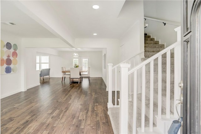 foyer entrance with dark wood-type flooring