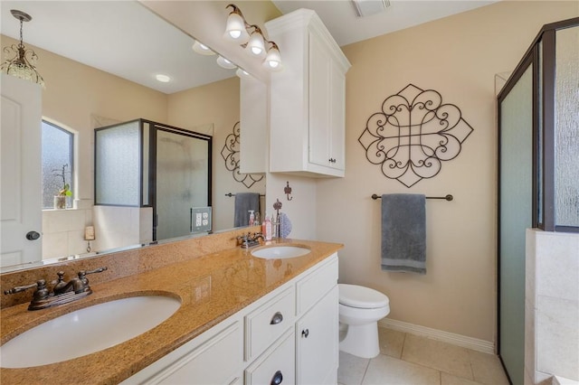 full bath featuring tile patterned floors, a stall shower, visible vents, and a sink