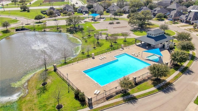 aerial view featuring a water view and a residential view