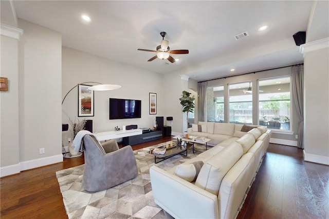 living area featuring a ceiling fan, hardwood / wood-style floors, baseboards, and recessed lighting
