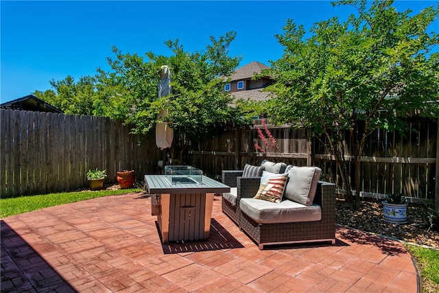 view of patio / terrace with a fenced backyard and an outdoor living space
