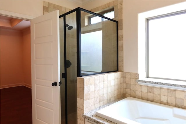2123 Chestnut Oak Cir, College Station, TX 77845 - full bathroom with crown molding, a shower stall, and a garden tub