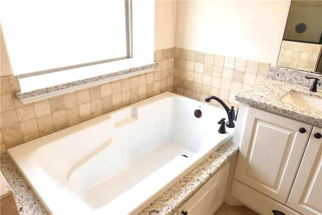 2123 Chestnut Oak Cir, College Station, TX 77845 - bathroom with vanity and a garden tub