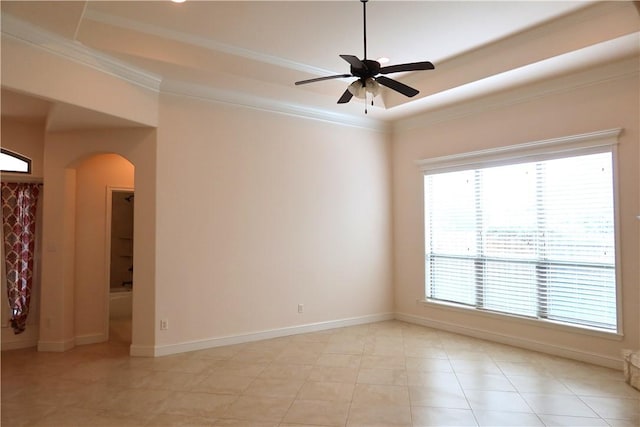2123 Chestnut Oak Cir, College Station, TX 77845 - spare room with arched walkways, a ceiling fan, crown molding, baseboards, and a raised ceiling