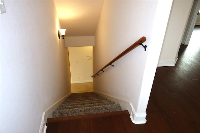2123 Chestnut Oak Cir, College Station, TX 77845 - stairway with wood finished floors and baseboards