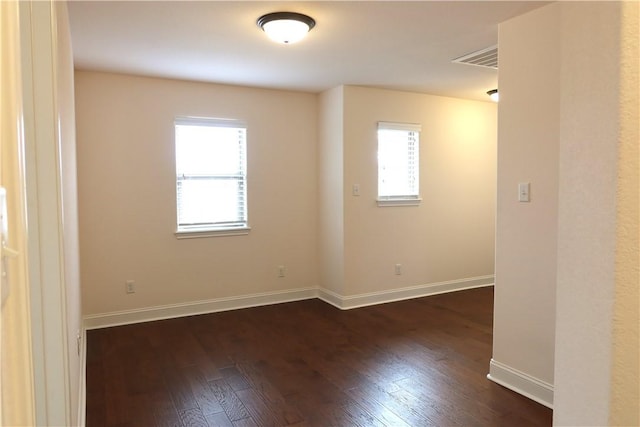2123 Chestnut Oak Cir, College Station, TX 77845 - unfurnished room with baseboards and dark wood finished floors