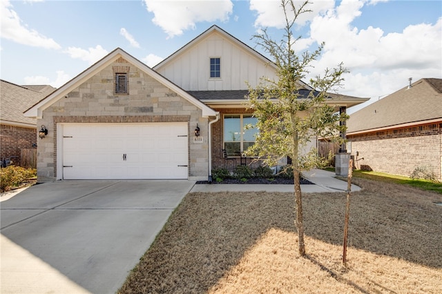 view of front of house with a garage, concrete driveway, brick siding, and board and batten siding