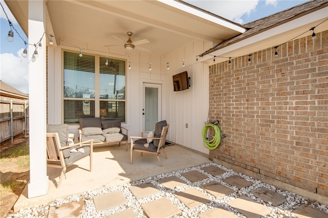 view of patio / terrace with ceiling fan, an outdoor hangout area, and fence