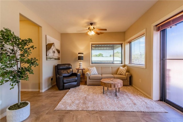 living room featuring ceiling fan