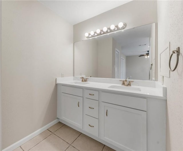 2008 Rayburn Ct, College Station, TX 77840 - full bathroom with tile patterned flooring, double vanity, a ceiling fan, and baseboards