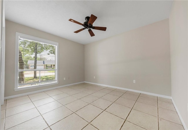 2008 Rayburn Ct, College Station, TX 77840 - unfurnished room with light tile patterned flooring, baseboards, and a ceiling fan