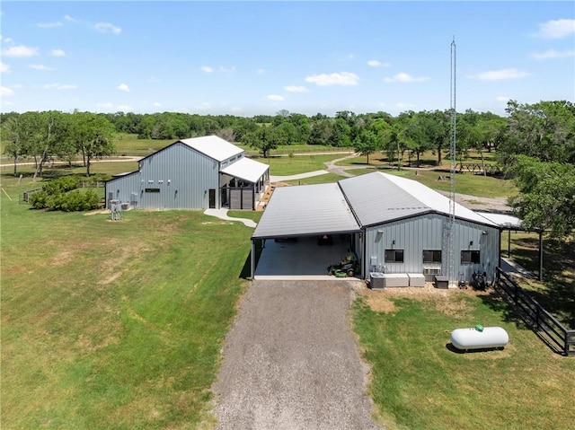 1923 County Road 202, Caldwell, TX 77836 - view of subject property with a tree filled landscape