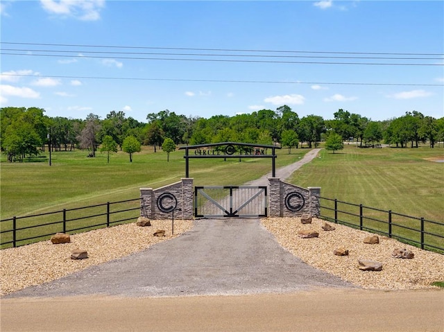 1923 County Road 202, Caldwell, TX 77836 - gate featuring view of scattered trees
