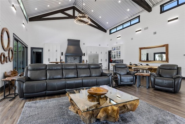 1923 County Road 202, Caldwell, TX 77836 - living room with high vaulted ceiling, wood finished floors, beam ceiling, healthy amount of natural light, and recessed lighting