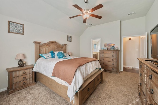 bedroom with ceiling fan, light colored carpet, and lofted ceiling