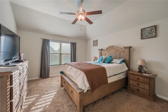 bedroom with ceiling fan, light carpet, and vaulted ceiling